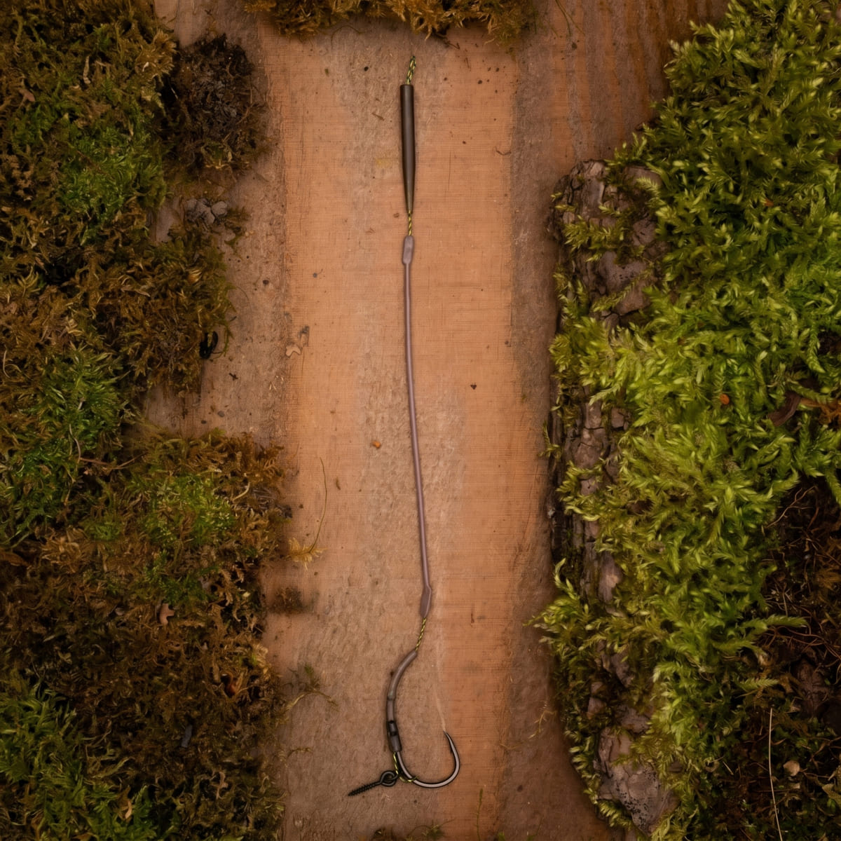 PB Products Bungee Multi Rig size 2 (SKU 25115), the whole ready tied rig laid straight on wood