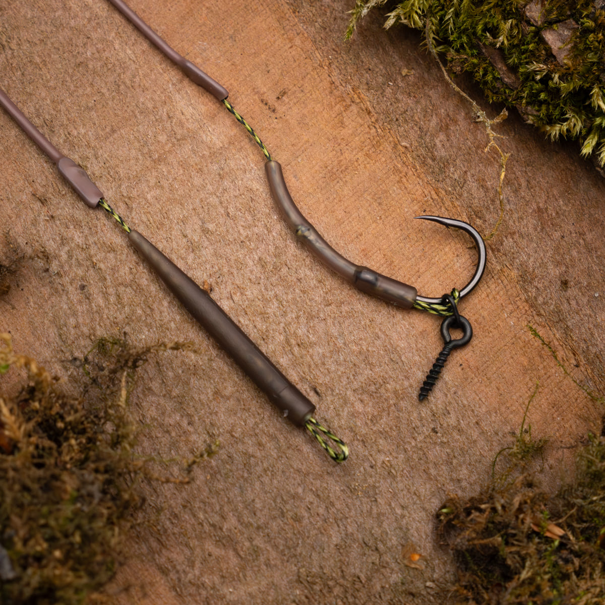 PB Products Bungee Multi Rig size 6 (SKU 25117) on wood: anti tangle sleeve, braided hooklink, curved aligner, hook and bait screw